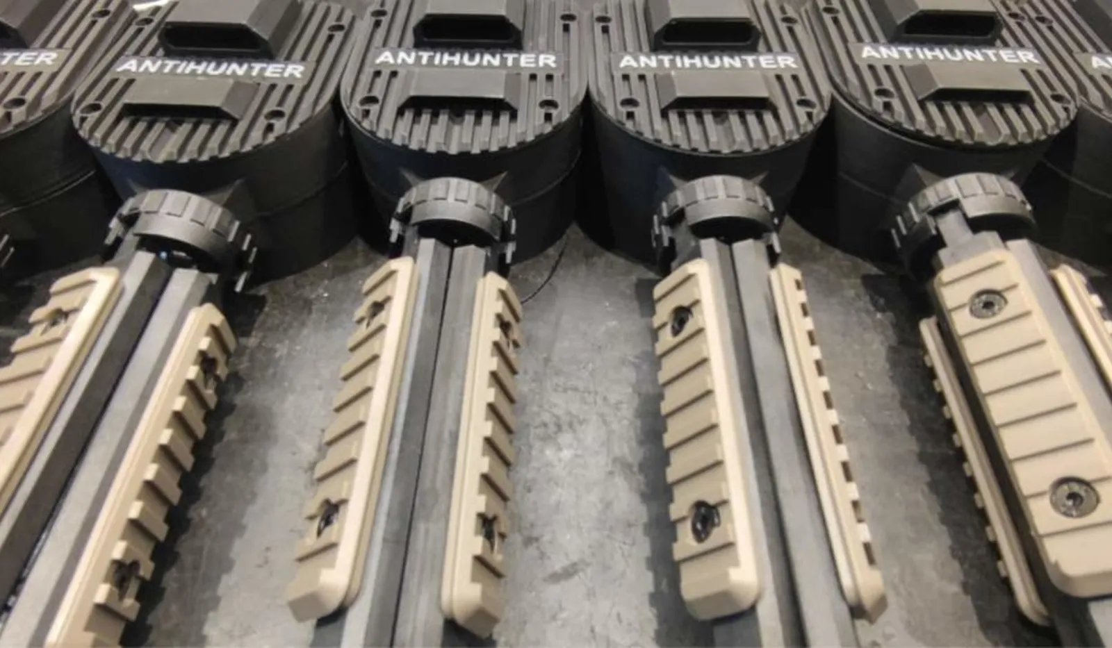 A batch of AntiHunter nodes being assembled by hand